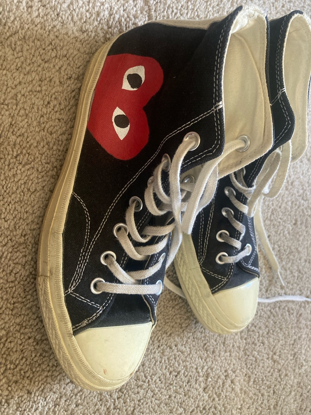 Converse Black High-Top Sneakers with Red Heart Graphic